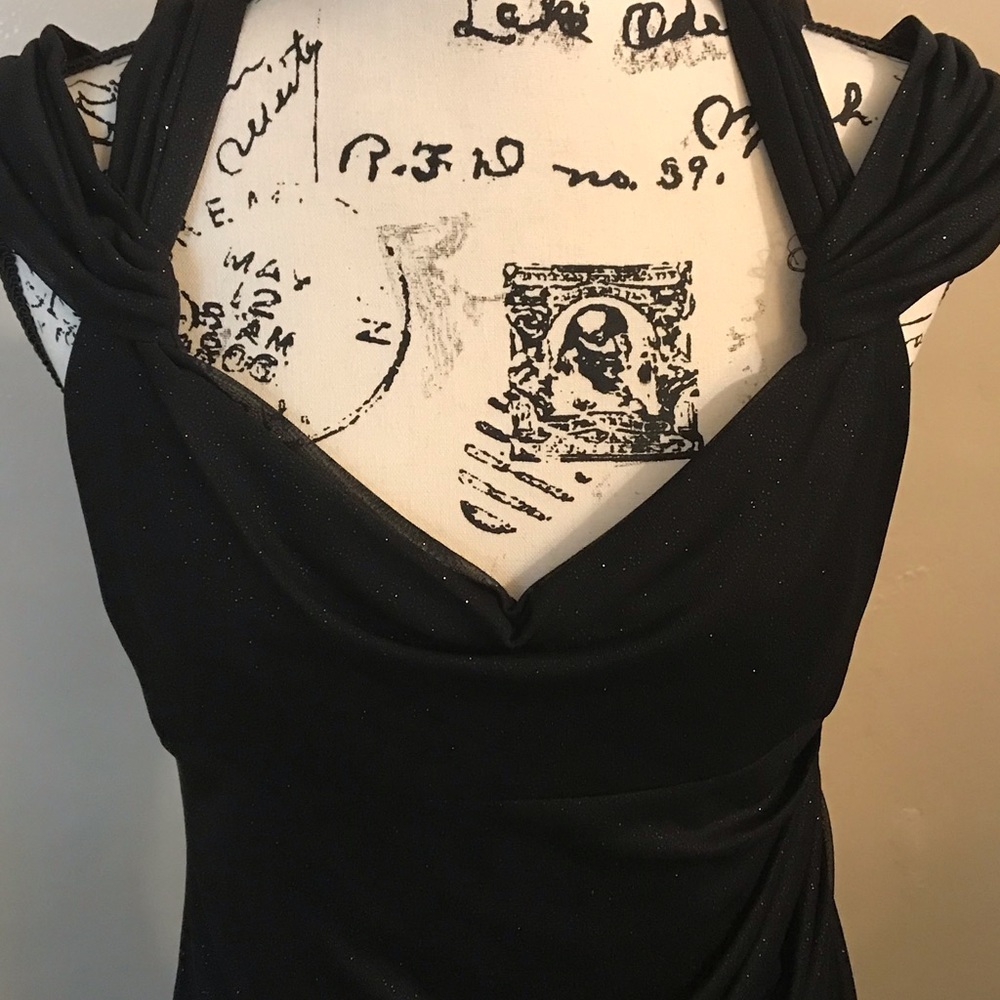 Woman’s size8 Black glitter gown.